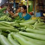 Inflation jumps 15-month high, slows