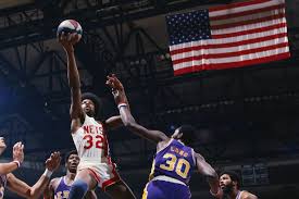 Julius Erving in action, showcasing his stunning athleticism.