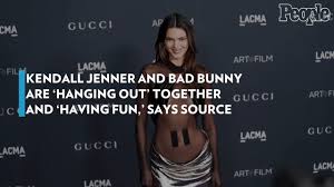 "Hanging Out" between Kendall Jenner and Bad Bunny is "having fun" and they are "doing a lot of things together," a source tells Us Weekly. The two are seen "hanging out" at a hotel in Paris on Wednesday night.

The two first met in early 2016 when Jenner was a guest on Bad Bunny