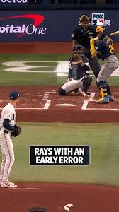 Liam Hicks with an early error that sends Yelich to third
