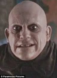Spot the difference: One viewer took to Twitter to compare Arg to Uncle Fester with his changed appearance - article-2226119-15CABD1D000005DC-302_306x423