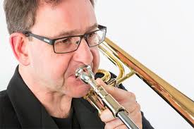 It is easy to see why the name Ian Bousfield has become synonymous with the trombone. Ian Bousfield and the 4147IB. Born in York, in 1964, Ian is a product ... - bousfield01