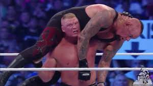 Image result for brock smiles at undertaker
