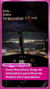 Grazi Massafera chega de helicóptero para show da Shakira em Copacabana