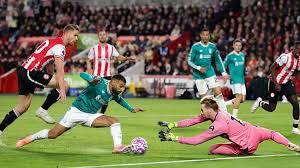 Salah Scores! But Liverpool's Woes Continue: Brentford Stuns Reds!