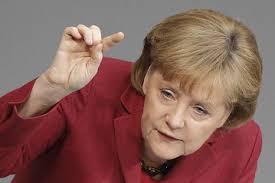 By Terence Roth. Reuters: Angela Merkel makes a point in her budget speech - OB-HW578_angela_E_20100317084019