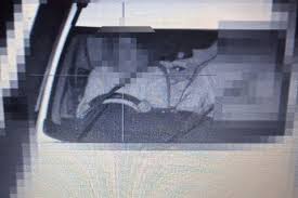 'It's clearly the windscreen wiper': Ex-lawyer fights seatbelt fine - Nine.com.au