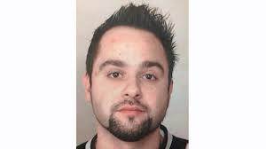 Stefan-Eduard Georgescu as seen in a photo taken by Longueuil police. - image
