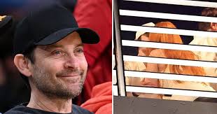 Truth revealed behind Tobey Maguire's 'kiss' with rapper 30 years his junior