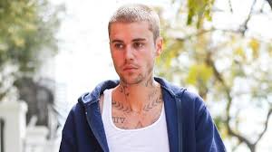 Justin Bieber's Father's Day: Flashy Gifts and Paparazzi Confrontation