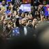 Clinton faces protests as she courts black voters
