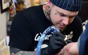 &lt; &gt; &middot; Alex Rattray, tattoo artist. Despite winning a place at the prestigious Edinburgh College of Art, Alex turned his back on a career in the mainstream ... - tattoo-alex-rattra_2728527k