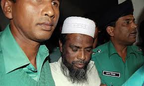 Mufti Abdul Hannan is escorted from court after being sentenced to death for plotting to kill a British diplomat. Photograph: Strdel/AFP/Getty Images - Mufti-Abdul-Hannan-001