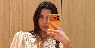 Dua Lipa Ends the Year With a $14,000 Diamond Watch and a Chloé Paddington Bag