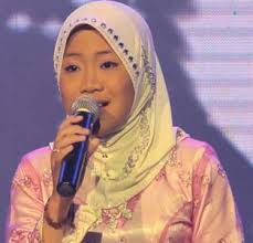 KUCHING: Nur Syahdina Nadiah, 11, from Ranau, Sabah emerged champion of the national level 2012 RTM Bintang Kecil competition beating eight other finalists ... - B33751