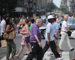 Image of person walking on a city street