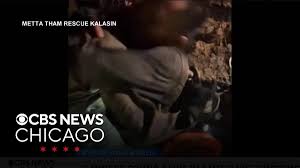 Divers reach 5 trapped villagers in flooded Laos cave; rescuers still working on how to get them out