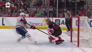Slafkovský tucks it in