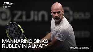 Adrian Mannarino serving during his match against Andrey Rublev at the ATP Almaty Open.