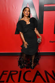 Angela Bassett Elevates Her Feathered Dark Glamour Look With a Crystal Skull Clutch for ‘American Horror Story: 13’