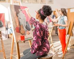 Image of person painting a picture