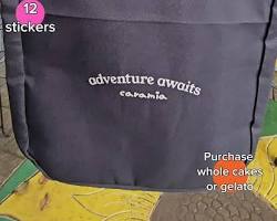 Image of person looking longingly at a ChickfilA bag