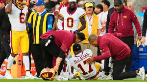 Commanders' Terry McLaurin carted off with knee injury in MNF loss to 49ers — ESPN