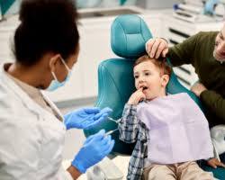 Image of child with special needs receiving dental care