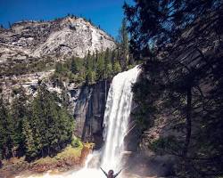 Image of hikers on the Mist Trail, Yosemite National Park, with Vernal Fall in the background