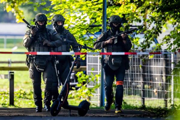 Search underway after 1 dead and 5 wounded in a shooting at a rave in Switzerland; police say motives and circumstances remain unclear