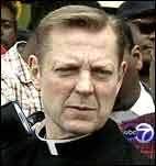 Michael Pfleger, pastor of St. Sabina&#39;s Church, exhorted the crowd to &quot;drag&quot; shop owner, John Riggio, from his shop &quot; ... - pfleger1