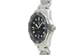 Image result for grigri-watches/search?q=grigri-watches/search?sca_esv=e08c057435075756 TAG Heuer Aquaracer Rubber Strap replacement