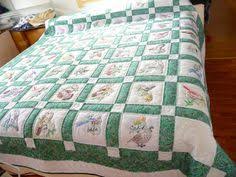 Résultat de recherche d'images pour "hand embroidered quilt with State Birds"