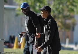 Image result for obama reggie love beach