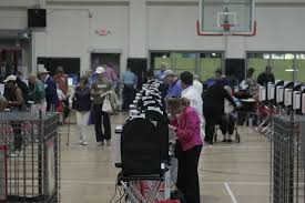 Texas' early voter turnout rate is down so far. Here’s why you’re still 
seeing long lines.