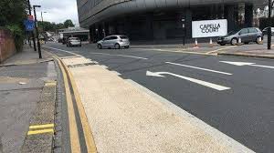 Council's funds frozen over removed bike lane wands - BBC