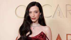 Mikey Madison Stuns on Oscars Red Carpet in Dazzling Red Gown