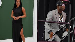 Deion Sanders and girlfriend Karrueche Tran are no longer hiding: A passionate kiss on the beach