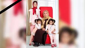 سلفی خانواده مقتول با قاتل به دار آویخته شده+ عکس