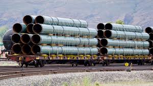 We're anxious to get it in the ground': Pipe yards fill ...