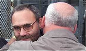 Patrick Magee (left) is greeted by former IRA inmate Martin Meehan - _375263_magee_meehan300