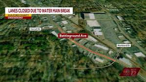 Officials: eight-inch water main break forces multiple lanes on Battleground Avenue to close