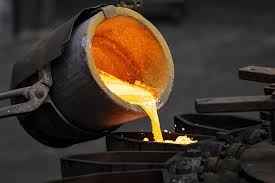 Gold Holds Near Three-Month High as Debasement Trade Returns
