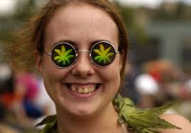 Jordan LeRoy sports marijuana glasses and a marijuana lei at Hempfest. - 72316202-jordan-leroy-sports-marijuana-glasses-and-a-gettyimages