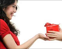 Image of person giving a gift to another person