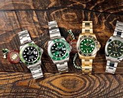 Rolex watches in a showcase, adjusted sizeの画像