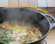 Image of pot of simmering biryani