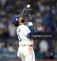 Licensable picture: Tampa Bay Rays third baseman Junior Caminero (13) catch a fly ball from Milwaukee Brewers designated hitter Christian Yelich