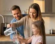 family drinking clean tap water in kitchen at home, AI generated