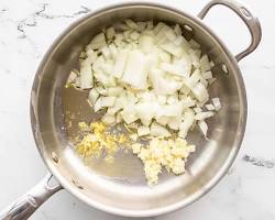 Onion, garlic, and ginger cooked in a pot